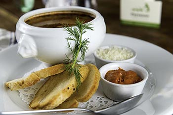 A Paysanne dish served with coffee and accompaniments